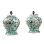 A PAIR OF CHINESE FAMILLE VERTE BALUSTER VASES