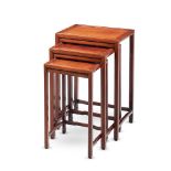A SET OF THREE CHINESE HARDWOOD NESTING TABLES