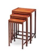 A SET OF THREE CHINESE HARDWOOD NESTING TABLES