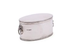 A SILVER OVAL BISCUIT TIN