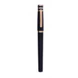 CARTIER, TROIS ORS DE CARTIER, A BLACK ROLLERBALL PEN