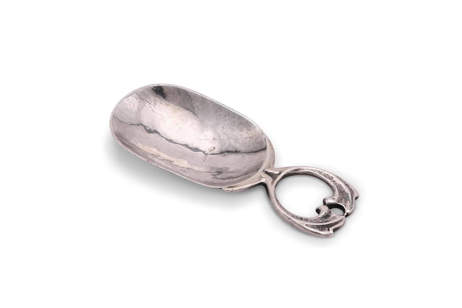 A SILVER CADDY SPOON