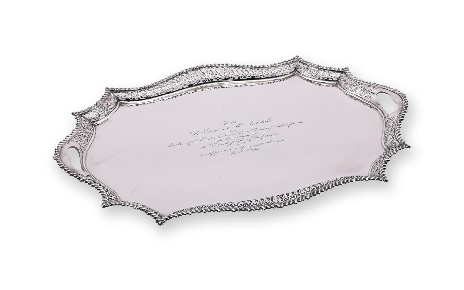 AN EDWARDIAN SILVER SHAPED OBLONG TRAY