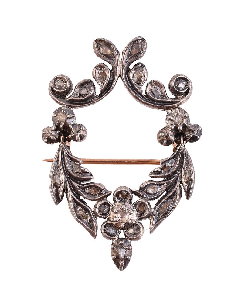 A DIAMOND FLORAL SWAG BROOCH