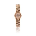 MATY, A LADY'S GOLD COLOURED BRACELET WATCH