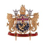 A LLOYDS OF LONDON, AN 18 CARAT GOLD, SAPPHIRE, RUBY AND DIAMOND COATS OF ARMS BROOCH, LONDON 1988