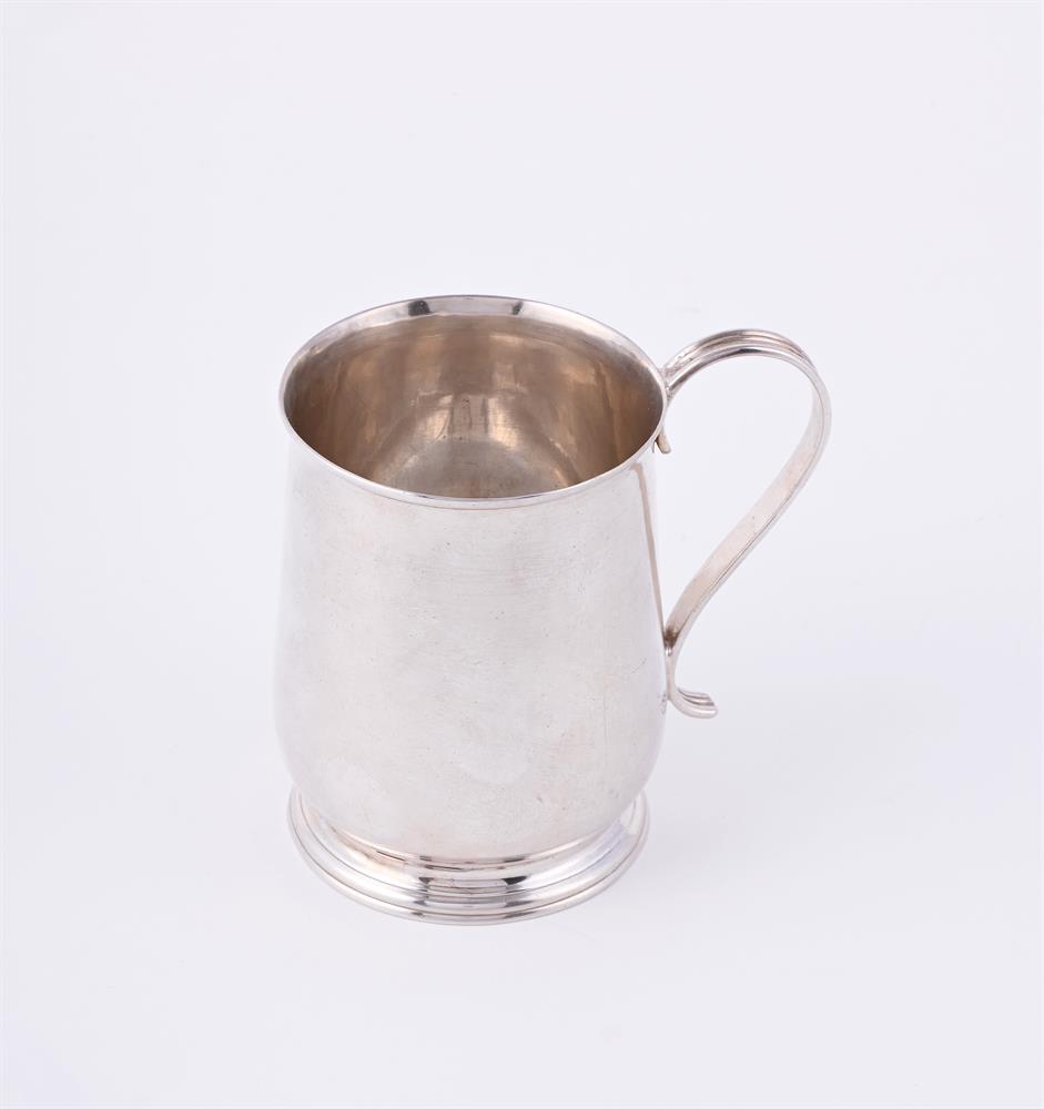 A GEORGE II SILVER BALUSTER MUG