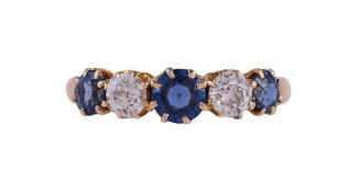 A SAPPHIRE AND DIAMOND FIVE STONE RING
