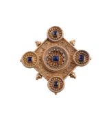 A MID VICTORIAN GOLD AND SAPPHIRE ETRUSCAN STYLE BROOCH, CIRCA 1870