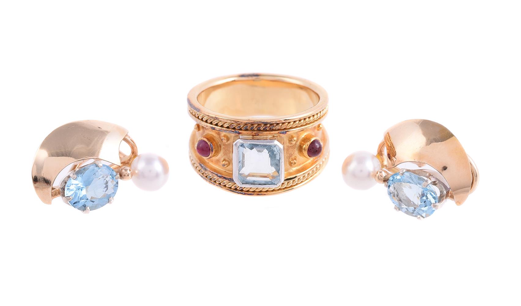 AN AQUAMARINE AND RUBY DRESS RING