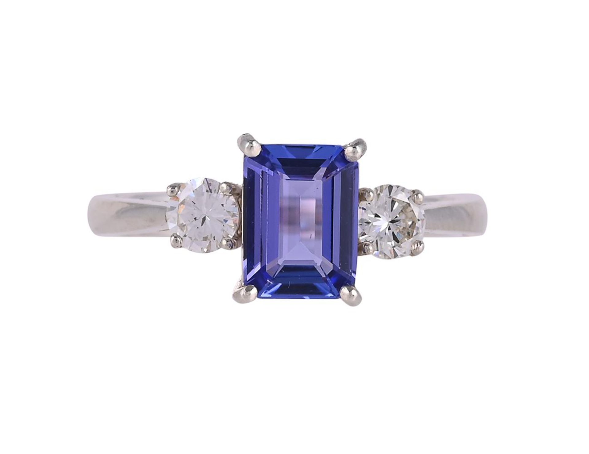 A THREE STONE TANZANITE AND DIAMOND RING