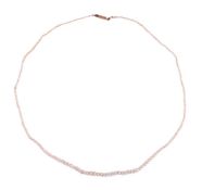 A GRADUATED SEED PEARL AND PEARL NECKLACE