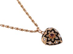 A CONTINENTAL EARLY 20TH CENTURY HEART SHAPED PEARL AND GARNET SET LOCKET ON FANCY LINK CHAIN