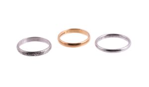 A TRIO OF BAND RINGS