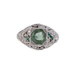 AN ART DECO EMERALD, DIAMOND AND GREEN TOURMALINE DRESS RING, CIRCA 1920