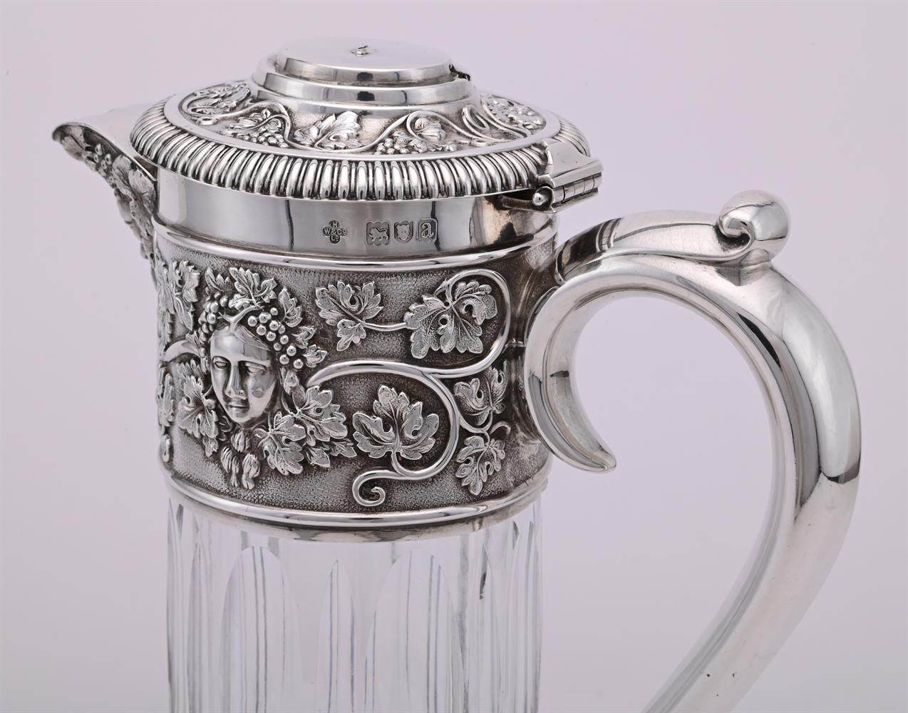 A LATE VICTORIAN SILVER MOUNTED CUT GLASS CLARET JUG - Image 2 of 2