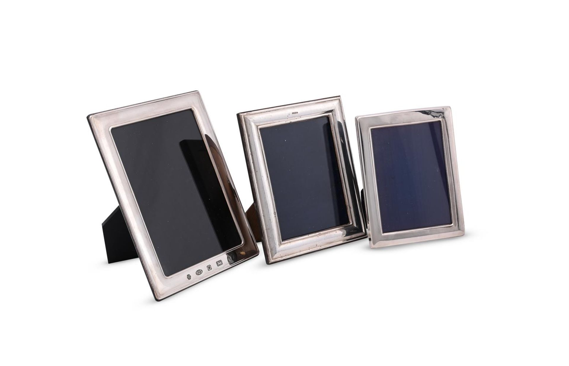 THREE PLAIN SILVER MOUNTED RECTANGULAR PHOTO FRAMES