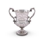 A GEORGE III SCOTTISH SILVER TWIN HANDLED TROPHY CUP