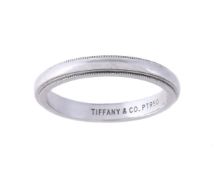 TIFFANY & CO., A PLATINUM COLOURED BAND RING