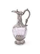 A FRENCH SILVER MOUNTED CLARET JUG