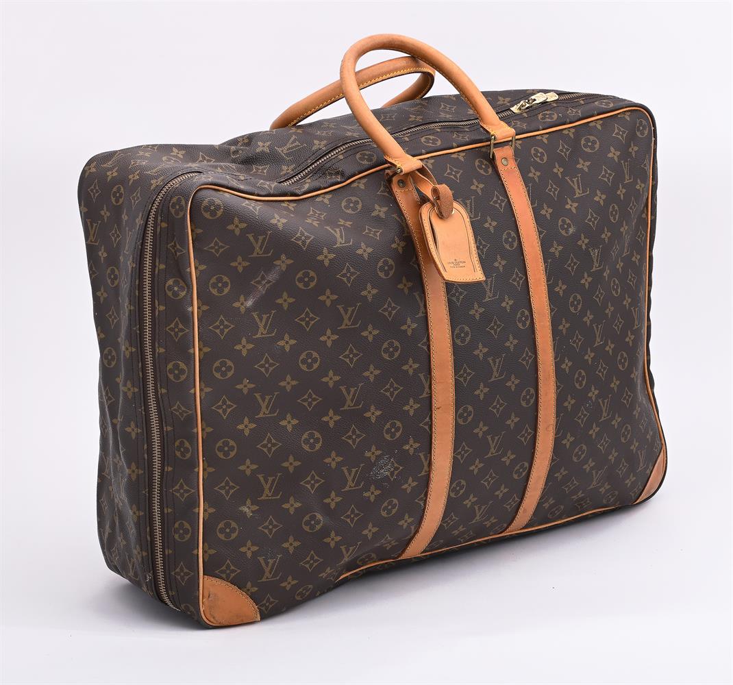 LOUIS VUITTON, A MONOGRAMMED COATED CANVAS SUITCASE