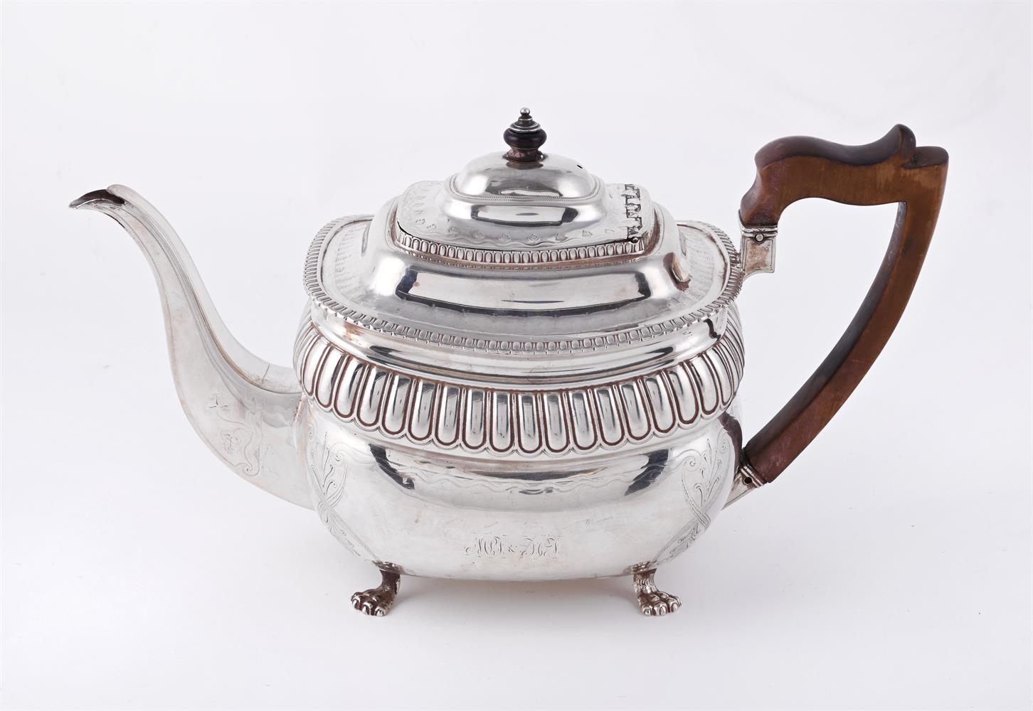 A GEORGE III SILVER OBLONG TEA POT