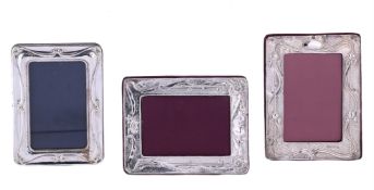THREE SILVER MOUNTED PHOTO FRAMES