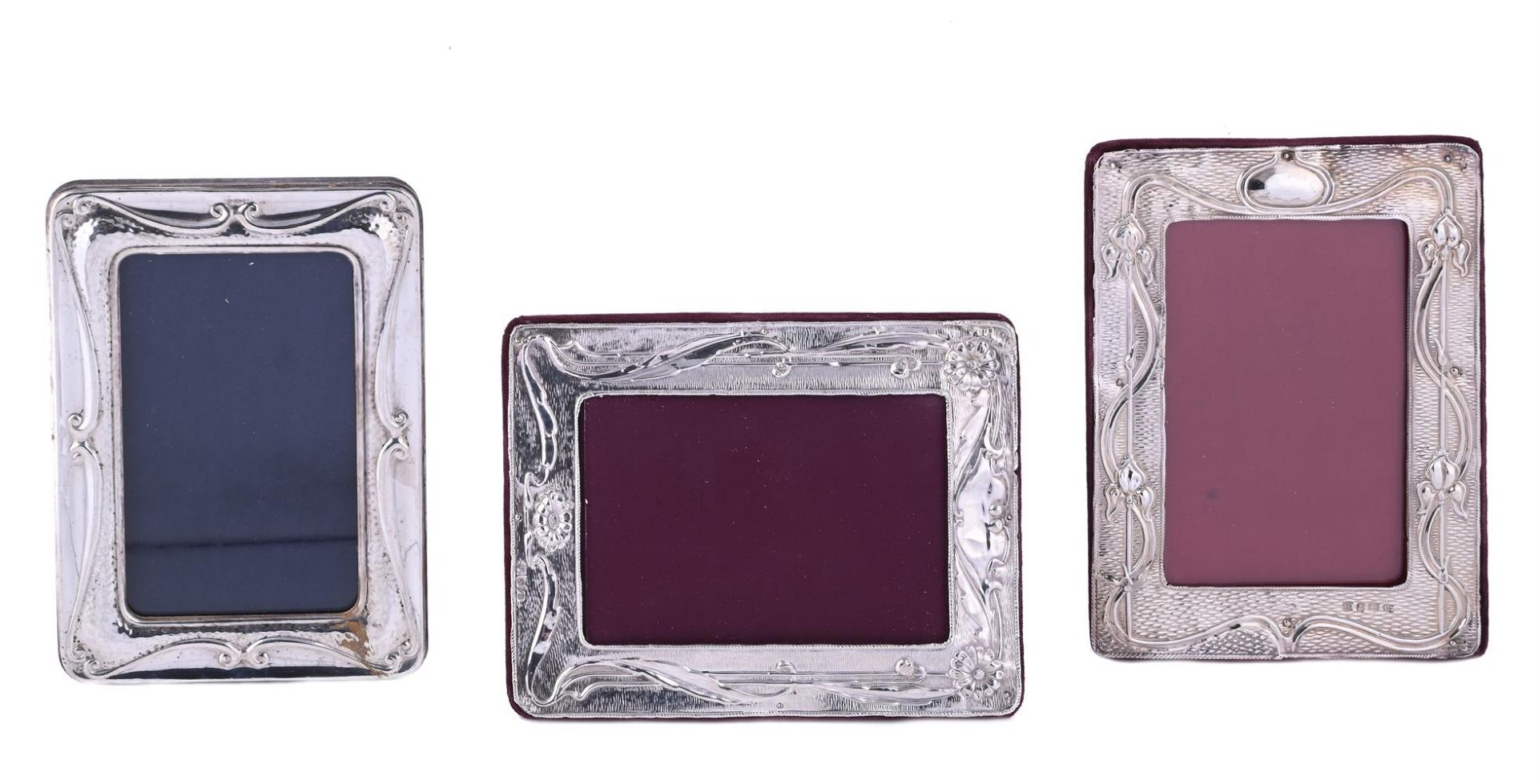 THREE SILVER MOUNTED PHOTO FRAMES