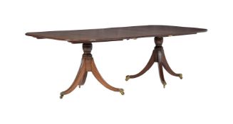 A REGENCY MAHOGANY THREE PEDESTAL DINING TABLE