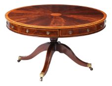 A MAHOGANY AND SATINWOOD BANDED DRUM TABLE IN LATE GEORGE III STYLE
