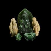 A GROUP OF FOUR JADE AND SOAPSTONE CARVINGS