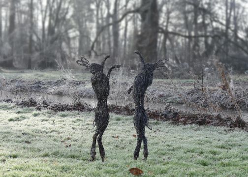 RUPERT TIILL (BRITISH B. 1969), TWO WIRE AND STEEL SCULPTURES OF BOXING HARES
