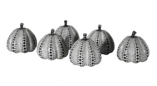 A SET OF SIX WHITE GLASS AND BLACK ENAMELLED MODELS OF PUMPKINS AFTER YAYOKI KUSAMA