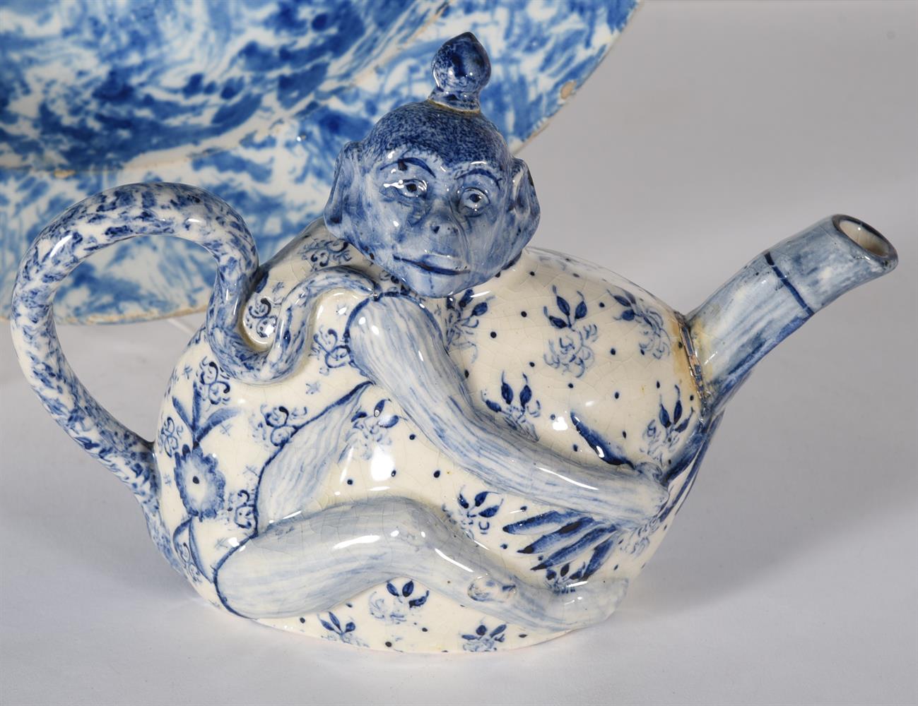 A STAFFORDSHIRE BLUE AND WHITE TEAPOT AND COVER - Image 2 of 3