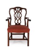 A MAHOGANY OPEN ARMCHAIR IN GEORGE III STYLE