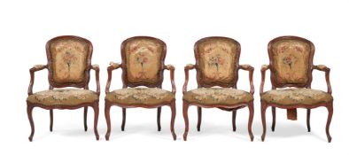 A SET OF FOUR FRENCH BEECH FAUTEUILSIN LOUIS XV STYLE