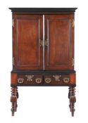 A DUTCH COLONIAL DARK HARDWOOD CABINET ON STAND