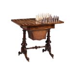 A VICTORIAN WALNUT GAMES TABLE