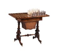 A VICTORIAN WALNUT GAMES TABLE