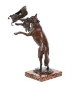 A BRONZE MODEL OF A FOX