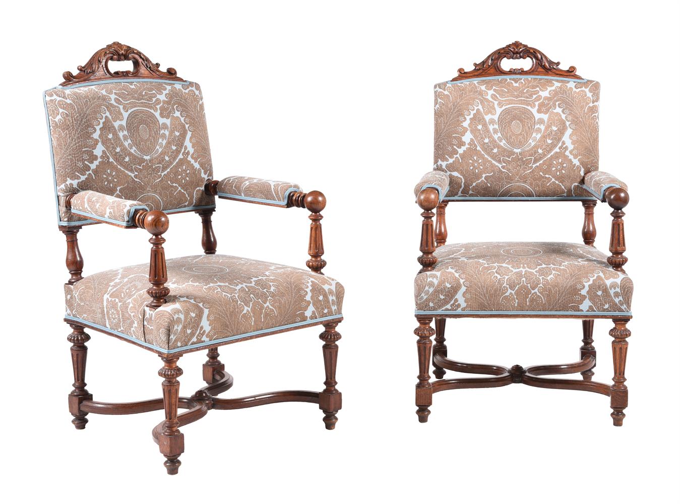 A PAIR OF VICTORIAN OAK ARMCHAIRS