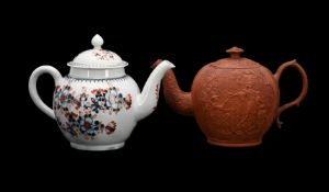 TWO STAFFORDSHIRE TEAPOTS AND COVERS