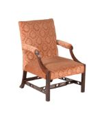 A GEORGE III MAHOGANY LIBRARY ARMCHAIR