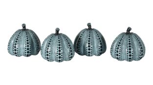 A SET OF FOUR BLUE GLASS AND BLACK ENAMELLED MODELS OF PUMPKINS AFTER YAYOKI KUSAMA