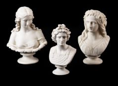 A GROUP OF THREE PARIAN BUSTS