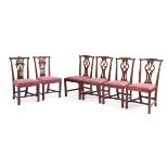 A SET OF FOUR GEORGE III MAHOGANY DINING CHAIRS