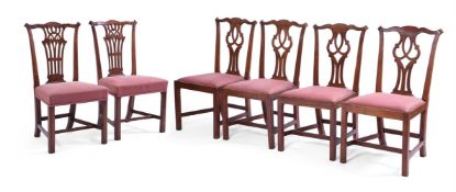 A SET OF FOUR GEORGE III MAHOGANY DINING CHAIRS