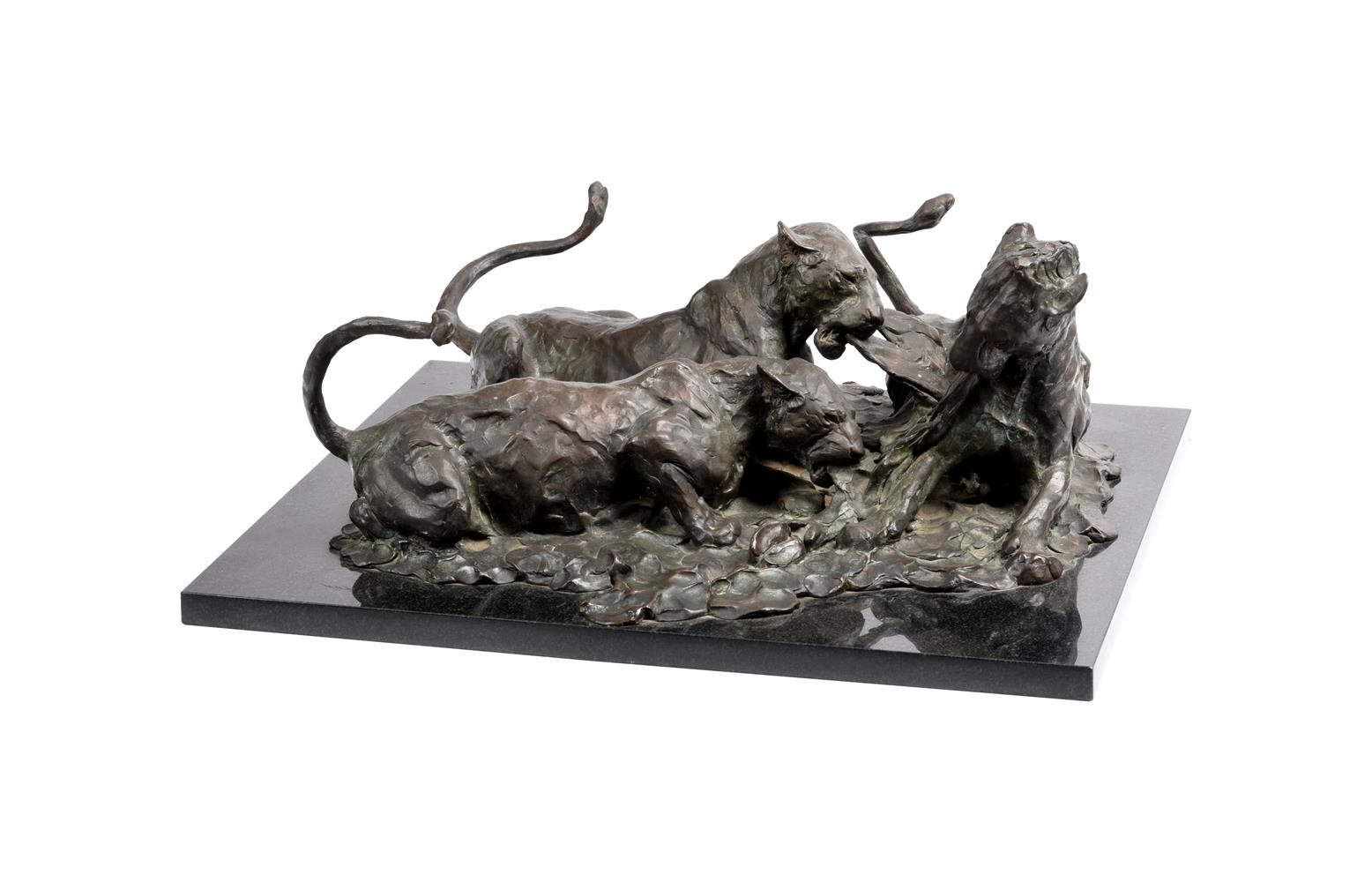 ROBERT GLEN (KENYAN b. 1940), A BRONZE GROUP OF THREE LIONESSES SHARING A KILL