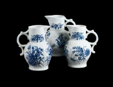 THREE VARIOUS WORCESTER BLUE AND WHITE PRINTED CABBAGE LEAF MOULDED MASK JUGS