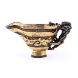 A CHINESE BRONZE ARCHAISTIC LIBATION CUP